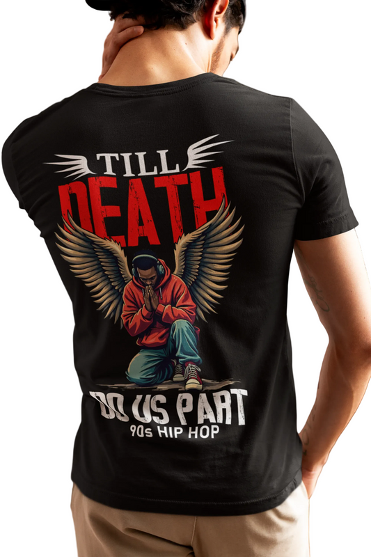 Person wearing a black t-shirt with a graphic design on the back, featuring text and an image of a person in a hoodie.