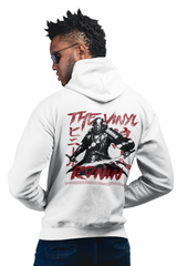 Man wearing a white hoodie with a graphic design on the back, standing against a white background.