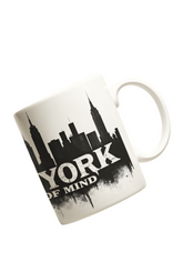 Mug with 'York of Mind' design on a yellow background with white flowers
