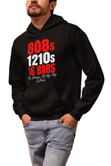 Person wearing a black hoodie with text design, standing indoors.