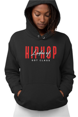 A woman wearing a black hoodie with 'LADIES OF HIP HOP GOT CLASS' printed in red text across the chest.