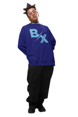 A person wearing a blue sweatshirt with 'BX The Birthplace Of Hip Hop' printed on the front, paired with black pants and black shoes.
