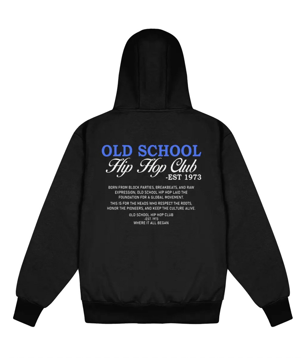 A black pullover hoodie shown from the back, featuring a graphic print with the text 'OLD SCHOOL Hip Hop Club -EST 1973' in blue and white, with additional text below detailing the hip hop movement.