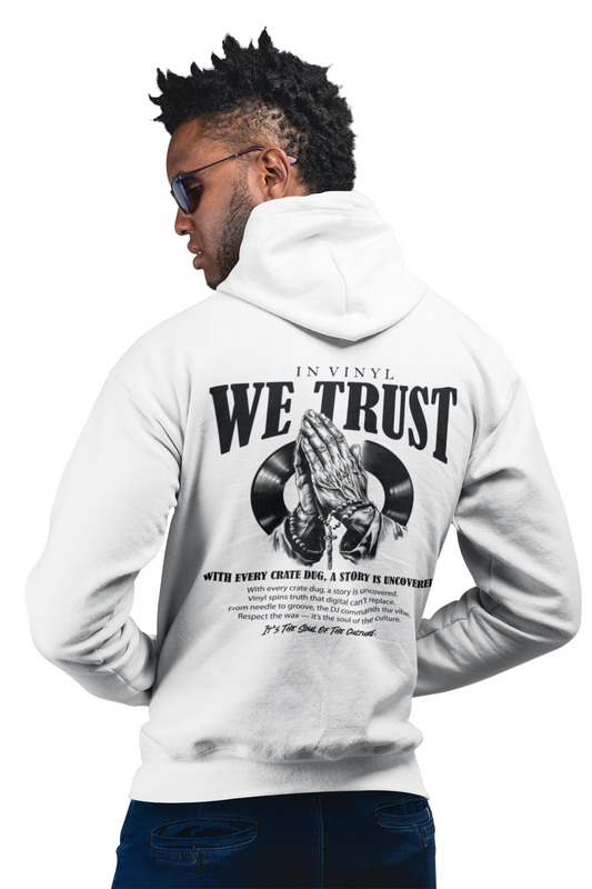 Man wearing a white hoodie with 'In Vinyl We Trust' design on a white background
