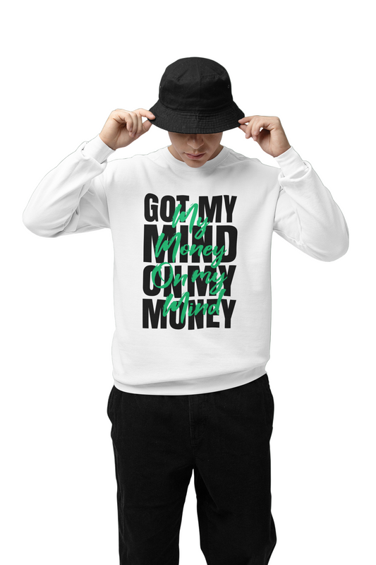Person wearing a white sweatshirt with text and a black cap on a green background