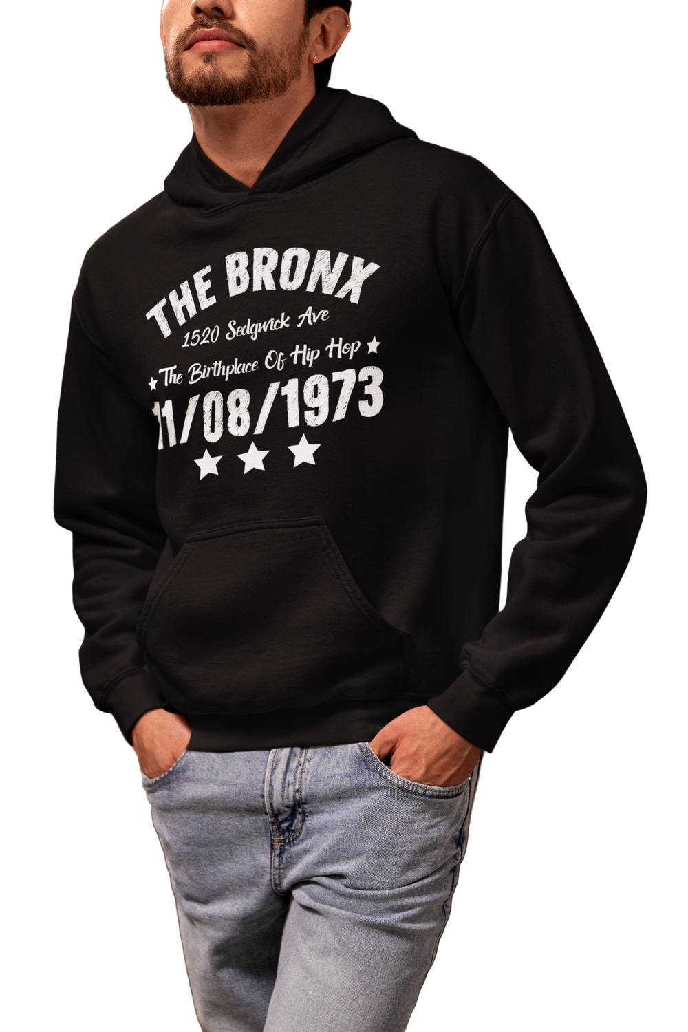 Person wearing a black hoodie with text in an indoor setting