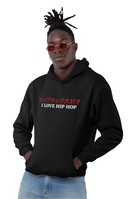 A person wearing a black hoodie with 'I LOVE HIP HOP' printed in both English and Japanese on the front.